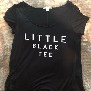 Black T-Shirt with the quote “Little Black Tee”.